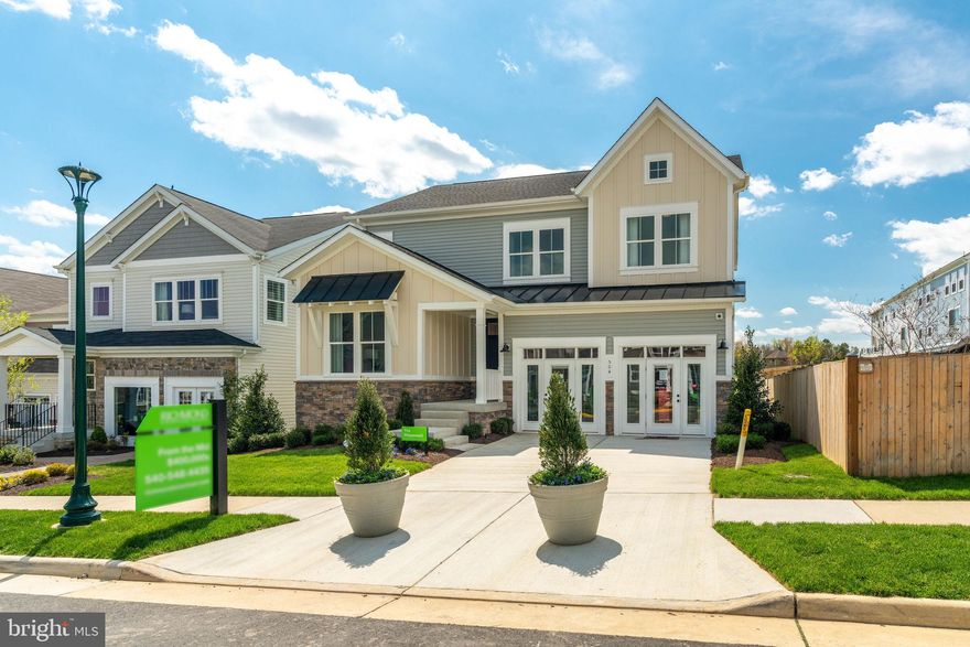 This is the stunning Hopewell Model Home. The wide-open great room with cozy fireplace is ideal for gathering with friends and family.  The adjacent kitchen allows you to interact with guests without interrupting meal prep.  The sunroom and covered screened-in deck add additional entertainment space.  There is also a guest bedroom and full bath on the main level.  The upper level features a large loft, 3 bedrooms, 2 baths, and convenient laundry room.  The lower level has a recreation room, full bath and lots of storage area.  Since this was a model home there are upgrades thru-out too numerous to list.