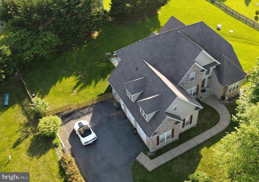 SO DESIRED CUSTOM BUILT HOME W/STONE ELEVATION & OVERSIZED GARAGE ON ACREAGE -OPEN 2-STORY FOYER & OPEN 2-STORY FAM RM W/ SPECTACULAR SKYLIGHTS AND GAS 3 SIDED FIREPLACE , 1ST FLR PRIMARY W/BAY WINDOW & LUXURY PRIMARY BATH W/ CERAMIC TILE FLR, CERAMIC TILE IN TUB/SHOWER. TRAY CEILING W/RECESSED LIGHTS IN LIVING RM, LARGE OPEN KITCHEN W/UPGRADED KITCHEN CABINETS W/GRANITE LARGE ISLAND ++, BREAKFAST NOOK W/SKYLIGHTS. LARGE BEDROOMS & BONUS RM (POSSIBLE 5TH BEDROOM) BASEMENT FULLY FINISHED WALK OUT WITH POTENTIAL 6TH BEDROOM/OFFICE/GUEST ROOM OR GREAT FOR AU PAIR/IN-LAW SUITE WITH FULL BATHROOM OFF.  LARGE FINISHED ROOM THAT CAN BE THEATER PREPPED FOR MOVIE SCREEN AND PRE-WIRED FOR SPEAKERS.  POOL TABLE IS AVAILABLE TO STAY WITH RIGHT OFFER.  ROOM FOR 2ND KITCHEN.   NOTICE, BUILDER UPGRADED ALL ROOMS WITH RECESSED LIGHTS  IN EVERY ROOM FOR AMPLE LIGHTING.

UPDATED HVAC 2020 WITH CARRIER/TRANE, ENERGY EFFICIENT .  GENERATOR READY 400 AMP SERVICE.

**HOME WARRANTY INCLUDED**

A MUST SEE TO APPRECIATE.   "WELCOME HOME".  

P.S SEE  PROFESSIONAL PHOTOS, 3D TOUR AND FLOOR PLAN ATTACHED

SELLERS WANT TO SEE YOUR OFFERS...MOTIVATED!