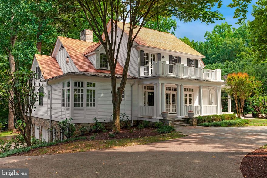 Built in 2000, designed by Rill and Decker Architects, this delightful New England-inspired home sits on a beautiful landscaped lot in the Merry Go Round Farm community in Potomac. A circular driveway leads to the impressive white frame home with stone foundation. The home's interior provides an open flow between living spaces, all with views of nature and access to the porches surrounding the home. The Main Level features a sumptuous Owner's Bedroom Suite, with large walk-in, accessorized closet and Owner's Bathroom. A beautiful Dining Room with French Doors to the front porch, opens to the Living Room at the heart of the home. The Living Room's stone fireplace adds warmth to the room, which opens to large screened porch overlooking the back yard. The Country Kitchen offers a large center isle with gas downdraft cooktop as well as a seating area, and includes an ample Breakfast Room. A Sun Room near the Kitchen provides lovely built-ins and a cozy space for reading or relaxing.  A large Laundry/Mud Room provides a separate service/family entryway to the house. Upstairs, a large paneled Study with built-ins fills the need for a home office or additional family space. Three Bedrooms on the Upper Level are served by Two Full Baths, along with a large storage room (potentially a 4th Bedroom). Beautiful hardwood floors, thick moldings, lofty ceilings, recessed lighting and custom fixtures combine to make this home a delight. The Lower Level is fully finished with a large carpeted Recreation or Family Room, an additional Bedroom, Full Bath, and large storage room.  An oversized two-car garage and large driveway provide for parking. The rear yard is large, private, backs to a community trail and may accommodate a swimming pool. Merry Go Round Farm is a wonderful community of 81 custom-built homes on 204 acres of land. The common grounds include an equestrian center with two well-maintained stables and ample pasture, miles of forest trails for hiking and riding, three small lakes, and several large rolling fields, perfect for picnics in warmer weather and cross-country skiing or sledding in the snow.  Groundskeepers and barn staff live onsite and tend to the land and the horses under the direction of a Homeowners' Association, of which all the residents are members.   Structural drawings showing floor plans are available.