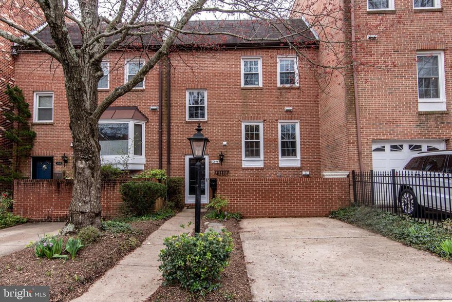 Amazing all brick townhome in the heart of Mclean, A rarely available townhome in highly sought after Mclean park manor. Mclean high school pyramid, Inviting luxurious marble tiled foyer,  Wood stairs leading you to enormous living room filled with Sun lights, Cozy wood burning fire place and built ins, overlooking wooded backyard, Formal dining room and fully updated gourmet kitchen with 42" Maple cabinets, granite counter tops, Upgraded appliances,  Huge walk out basement fully finished with a bed room and full bath, step out to  fenced in patio for an amazing outdoor entertainment and relaxation.  Beautifully updated bathrooms, upgraded tiles,  New vanities, Granite counter tops. Gleaming hardwood floors on multiple levels. Fresh paint through out. Seller may need 2 day rent back