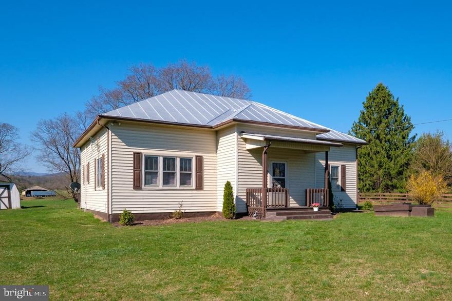 Rare opportunity to own a part of history! This charming cottage was formerly the Genoa School dating back to the early 1900's until1961. Original character of an old school is there and can be enhanced by opening up ceiling for high 10' ceilings, expose the craftsman window in foyer closet or have leaded design done for keepsake! New flooring in kitchen and living room and fresh paint throughout. 3 spacious bedrooms with step-in closets. Large utility/laundry room off the kitchen housing the Chlorinated Water System, hot water heater, and laundry hookup. Relax on the rear deck to enjoy the quiet country setting. Space for garden and raised bed(s). Convenient to Turner Ham, North Fork of the Shenandoah River, fishing at Slate Lick Dam, and the National Forest! Short distance to town of Broadway, Lost River State Park and more!