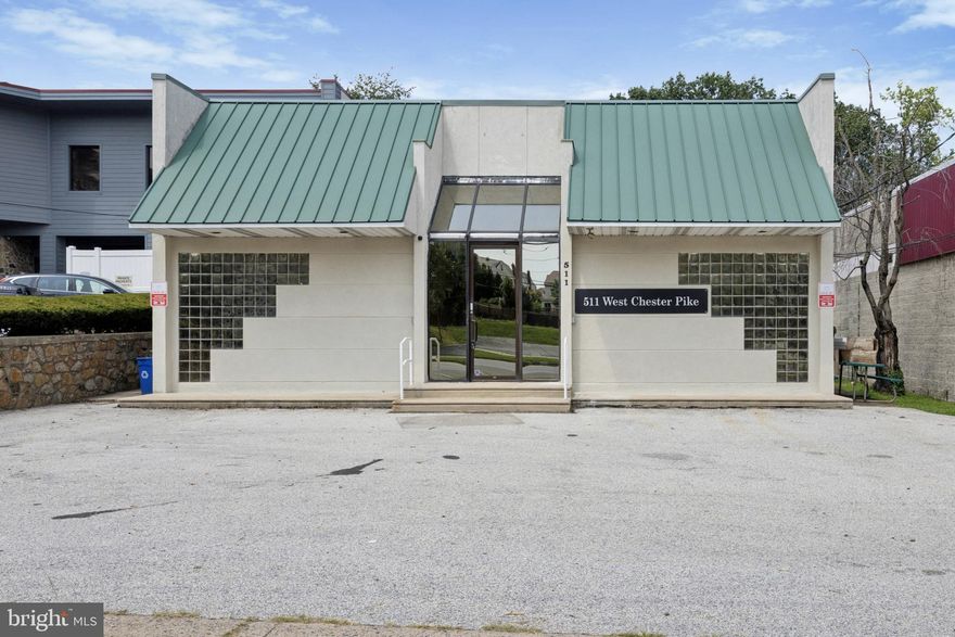 This unique +/-6,000 sf building features high ceilings, with skylights that produce an abundance of natural light.

It is currently fit out with a large open lobby area, multiple office areas, and a kitchenette.

This is an ideal location that could be tailored for a variety of Office/Retail, or Flex Space/Studio uses.

There is ample off-street parking - in front of, and in back of the building.

Conveniently located with frontage on the heavily traveled West Chester Pike.