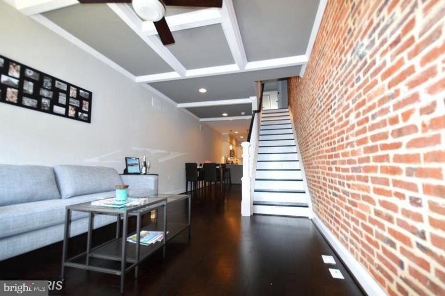 FANTASTIC 3 BEDROOM 3.5 BATH ROW HOME AVAILABLE IN THE HEART OF CANTON! HARDWOOD FLOORS THROUGHOUT. GOURMET KITCHEN WITH AMPLE CABINET SPACE, BREAKFAST BAR, AND STAINLESS STEEL APPLIANCES. FINISHED BASEMENT. PARKING PAD IN REAR OF HOME. ROOF TOP DECK WITH AMAZING VIEWS OF CHARM CITY, PERFECT FOR ENTERTAINING. SCHEDULE YOUR PRIVATE SHOWING TODAY!