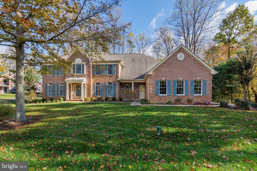 Welcome Home to 1500 Habersham Place located in Annapolis Preserve. Stunning Brick Colonial located on Cul de sac lot that backs to Woods. Home features 5 bedrooms each with their own full bath. Updated Master EnSuite consist of sitting room, dual vanities, soaking tub and separate shower, walk-in master closet with built-ins.  All rooms are generous in size. On the main level there's a separate living room and formal dining room with built in serving areas. Family room   includes a wood burning fireplace and entrance to sunroom.. Need a private quiet place to work, you'll find it at the other end of the house with built-in wall to wall bookcases. Generous in size for two desks and several computers.  Gourmet kitchen with center island gas cooktop, double wall oven, granite counters. and expansive table space. 2nd staircase near kitchen to upstairs bedrooms. Just off the kitchen is an enviting sunroom with wet bar and lots of windows for bird watchers.  5th Bedroom with full bath located near front of house with separate entrance. Lower Level Family Room has a game room, bar area, full bathroom, and Den. Lots of room for entertaining. Could be used as an  In-law Suite, Au-pair Suite, and/or Theater Room. Minutes to Annapolis, easy commute to DC. Close to major roads, shopping and restaurants.