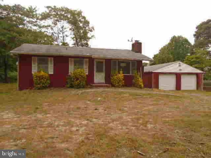 Nice size Rancher features Full size enclosed porch in rear.  Open floor plan with wood floors through-out most rooms. Living room has  Fireplace.  Galley kitchen opens up to dining area and also leads to rear enclosed porch.  2 Bedrooms and full bath complete main level.  Basement is unfinished.  Over sized 2 car detached garage with plenty of storage or work bench. Close to schools and shopping. Easy access to 97 and Rt 100 . Agents please see agent remarks and all documents on this listing for contract details.