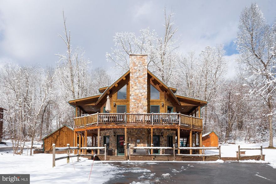 Beautiful log chalet right in the heart of everything Deep Creek Lake has to offer!  This 5 bedroom home located on Rock Lodge Road will have you enjoying the lake lifestyle in no time!  Take in the view of Deep Creek from the large wrap around deck which includes a covered hot tub and plenty of space to entertain.  There is even more room to spread out and relax outdoors with the hardscaped patio area that will lead you to the stone firepit!  Inside is sure to please as well, with lots of natural light gleaming into the open kitchen, dining, and living area on the main level that showcases an amazing stone fireplace.  Nice touches on the lower level include a mud room for entry after a day on the slopes and a bonus room for even more space for quests!  Don't miss this excellent opportunity,  call me today to schedule your private tour!