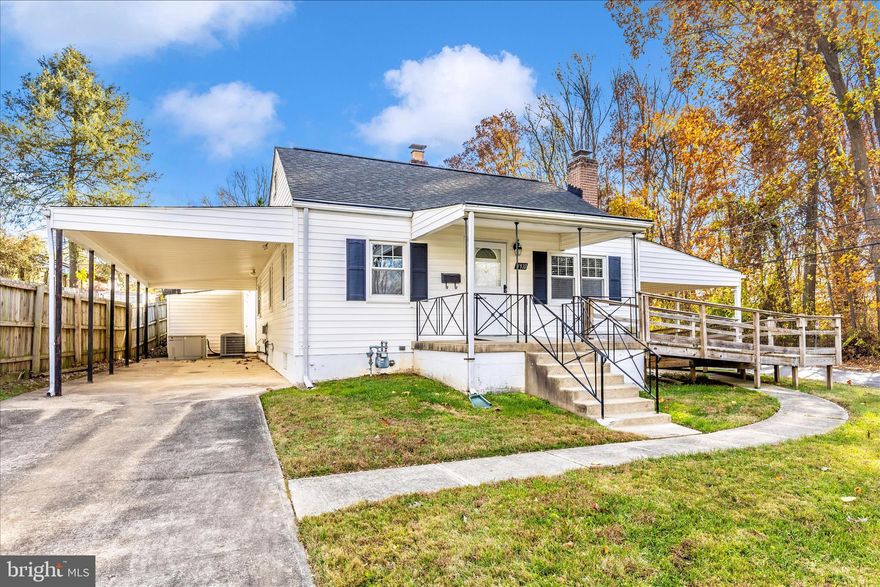 Charming well maintained  Three bedroom 2 full baths bungolow.  Fresh paint and original refinished hardwood floors. Large kitchen with space for a full sized table.  Stainless steel appliances. Lower level features a family room with a wood burning fireplace, and a full bath with shower.  Laundry and work shop complete the finished lower level.  This house has a whole house generator .The side yard has patio with handicap ramp.  This house has lots of parking with 2 driveways. One to the   Garage and the second to the Extra tall Carport . Plenty of parking with room for up to 7 cars.  Located across from Dewey Park with access to Rock Creek Parks hiking/biking trails, large assortment of playground equipment and dog park. Great commuter location.