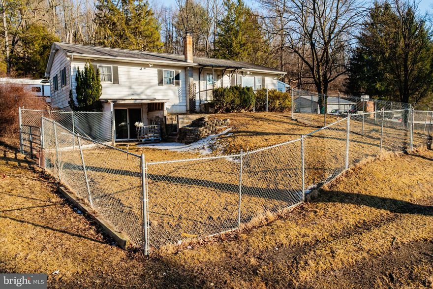 **Highest & Best has been called for 3/5/25 at 6pm**
Welcome to 670 N Hokendauqua Dr! This beautiful scenic location is perfect for anybody looking to come home and decompress in your own oasis. It features 4 bedrooms, a  sunroom, hardwood flooring, woodburning and coal stoves, large kitchen, home security, and a partially finished basement. The house is perfect for entertaining too! The "party pavilion" has a sink, hot tub hookup, and room for plenty of seating. The partially finished basement is a great hangout area  with a pool table and mounted TV. The above ground  pool and firepit are great for the warmer summer months. Not to mention, the animal barn and fenced in 3.5 acres of pasture.  For the fresh vegetable lovers, there is a garden within a fenced in  orchard, including aged apple trees and concord grape vines.  This house also features a carport and 2 garages, with one garage being newly built, coming the end of April.  Storage is not a problem here with the the additional shipping containers by the upper garage. So if you are looking to enjoy beautiful sunsets on your own homestead, call for a showing today!
Photos by Michala Reber Photography