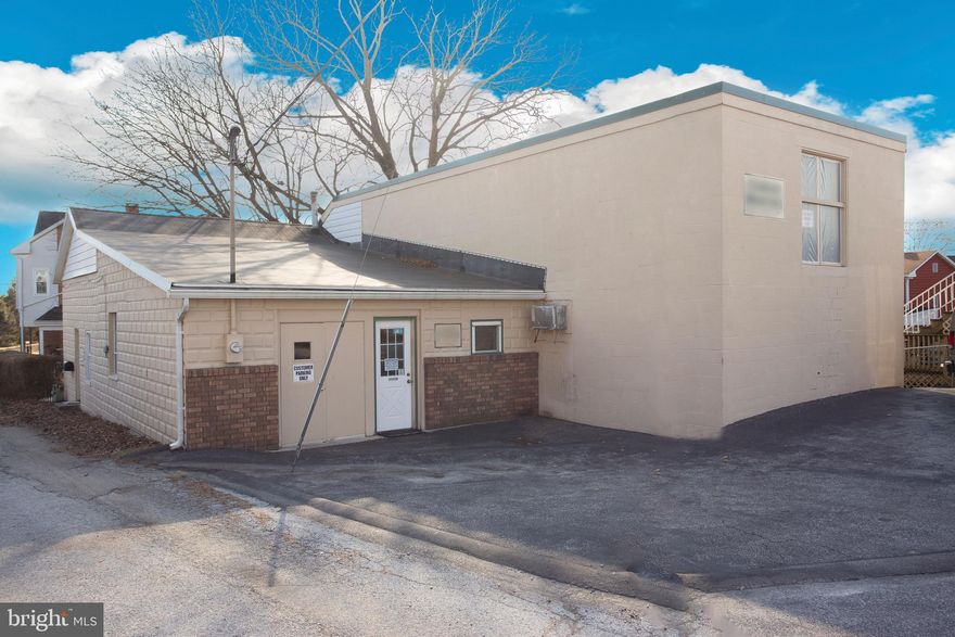 3300 square foot building currently used as commercial print shop.  Off street parking, heat, water, sewer and electric service. Concrete floor.  Front office,  2 large first floor shop areas, plus additional storage and 2nd floor space.  Seller will convey commercial printing equipment if new owner desires.  Would make ideal contractor home base, light manufacturing, warehouse, or studio space. Current owner operates under special exception to zoning. Check with borough for potential uses.