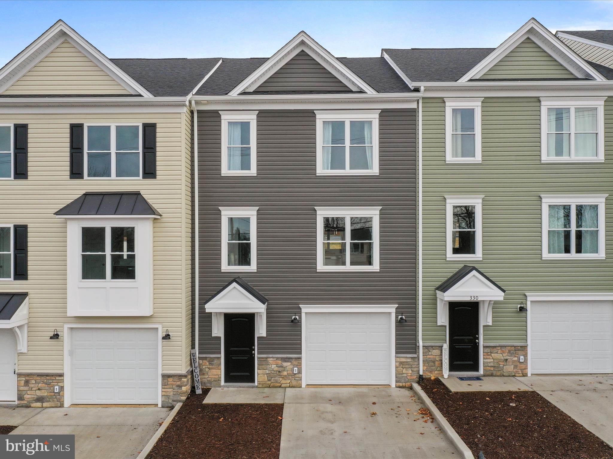 Brand new 3 level townhomes! Ready for immediate occupancy! 3 Large bedrooms 3.5 baths, family room with full bathroom in basement. The builder has added all the extras! Trex rear deck with privacy panels on rear decks! In home office offers Xfinity high speed internet. Smart car outlet located in 1 car garage. Stainless steel appliances, quartz countertops, tile floors in bathrooms, and NO HOA fees!