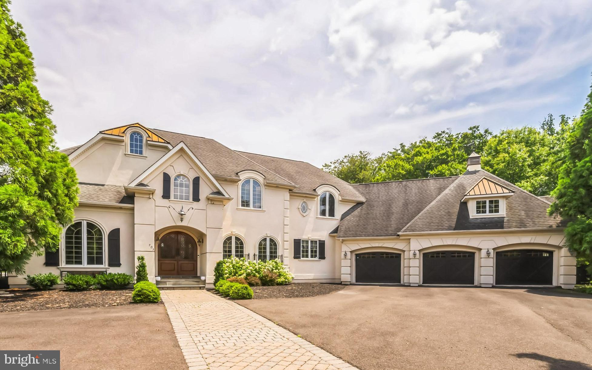 Welcome to this fabulous custom-built home in the sought after Greystone Development in Ambler/Horsham Township. A gorgeous, curved wood door is the first of many unique features you will find in this stunning home. A gracious foyer with hardwood flooring welcomes you and is flanked by a home office and a formal dining room. The spacious first floor home office has built-in bookshelves, 2 huge windows for lots of natural light, carpet and border in-laid hardwood floors. The formal dining room has stunning woodwork and ceiling, in-laid hardwood flooring and a French door to a private patio. The expansive foyer opens into a huge "Great Room" with custom wood ceiling, floor to ceiling windows, hardwood flooring and fireplace. This room is wonderful for everyday use and entertaining! The kitchen boasts granite counters, custom cabinets, tile flooring and stainless-steel appliances including a 6-burner range with pot filler and double oven and island with seating. The sun-drenched breakfast room is the perfect spot for morning coffee and has a door to a deck overlooking the backyard. The primary bedroom suite has a sitting room, bedroom, his and hers walk in closets and a spa like bathroom with stall shower and free-standing tub. A first-floor laundry/mud room is a great drop zone for bookbags and sports equipment and has access to the 3-car garage. A formal powder room completes this floor. The second floor has 2 en suite bedrooms with walk in closets and a large sitting room/second office with built-ins and a juliet balcony overlooking the foyer. The professionally finished full walk out basement has custom woodwork and everything you could want or need! There is a full bar area with seating, family room with gas fireplace and door to backyard, media/theater room with seating for 6, a bedroom with walk in closet and a full bath, an exercise room, game room with butler pantry area and wine fridge, a craft room and another full bath. If you have an au pair, need space for in-laws, college age kids or frequent out of town guests you will love this incredible space. The outside of the home is just as special as the inside and offers a private, fenced 1.57-acre lot with an inground pool and lots of space to enjoy the outdoors. The incredible location is the icing on the cake! There is a walking trail around the development, and it is minutes to Whole Foods, Starbucks, Ambler YMCA, restaurants, shopping, movie theater, several golf courses/clubs, downtown Ambler and Ambler and Ft. Washington Train Stations, PA Turnpike and a short commute to center city. HURRY!!