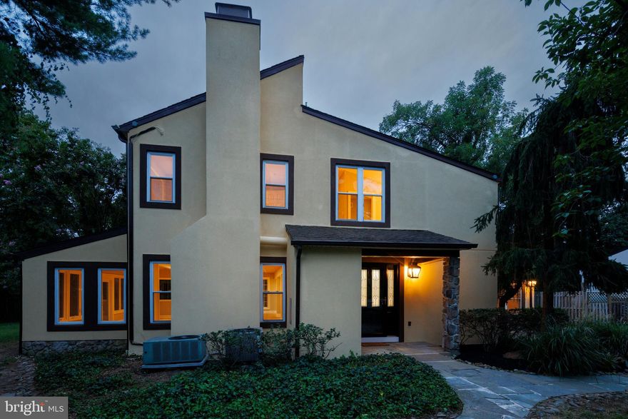 An idyllic cul-de-sac in the heart of Wynnewood plays host to 610 Argyle Cir. This large, open, and airy 2-story home offers 4 bedrooms, 2.5 bathrooms, a deck, a secluded yard, modern updates throughout, and placement in the award-winning Lower Merion School District. Set back from the street, mature trees provide privacy out front, where an oversized driveway leads to a main and side entrance. A foyer with a coat closet and a powder room welcomes you inside. Gleaming hardwood floors stretch to an expansive living room with tons of space for entertaining or hanging out. A brick fireplace mantel anchors one end, while patio doors are at the other. A bonus sunroom, with natural light pouring in from a wall of windows and skylights, is off the living room. The heart of the home is sure to be the open dining room and chef's kitchen fitted with generous custom cabinetry, granite counters, high-end Viking stainless steel appliances, dual sinks, and a massive island with breakfast bar seating. Completing the main level is another huge family room with vaulted ceilings and an entrance from the driveway. Up on the second level, French doors reveal a hotel-like primary suite boasting hardwood floors, cathedral ceilings, skylights, a walk-in closet, and a peaceful terrace, ideal for enjoying a morning cup of coffee. The luxurious ensuite is adorned with a double vanity, a whirlpool tub, a glass-enclosed rainfall shower, and convenient access to the laundry room. Off the hall are three more bright bedrooms with custom closets and another full bathroom. In addition to everything inside, the private backyard is made for hosting family and friends, featuring a raised deck, hot tub, and grassy area. 610 Argyle Cir's sought-after location is less than 5 minutes from shopping in Wynnewood and Suburban Square with stores like Whole Foods, Trader Joe's, and Target. Sprawling South Ardmore Park is steps away, Lankenau Medical Center is close, plus there's easy access to Lancaster Ave and City Ave. Schedule your showing today!