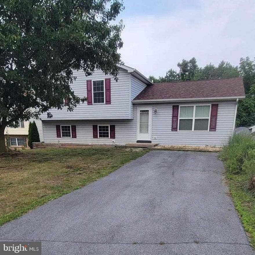 Don't miss your opportunity to grab up this cozy and newly renovated split foyer just minutes from downtown Martinsburg! Enjoy your evenings in your large, flat backyard with a spacious deck in a great neighborhood.  Plenty of room to stretch out with 3 bedrooms, 2 full baths and 2 separate family rooms!! These don't last long!