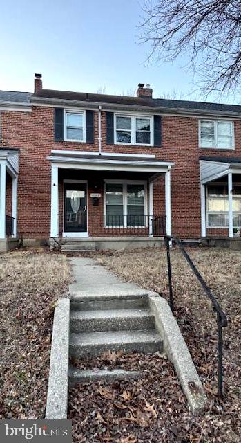 Welcome to 6142 Dunroming Road conveniently located in the quiet neighborhood of the Glen Oaks community in Baltimore City. Updated, charming, 1280 square foot, 3 Bedrooms, 1.5 Bathrooms brick townhome. Original, beautiful hardwood floors and updated laminate flooring throughout the main and upper level of home. Plenty of kitchen cabinets, stainless steel appliances, nice gas stove, double sink and dishwasher along with a breakfast bar! Large cozy knotty pine family room with a bar. Central air and ceiling fans. Windows , blinds and doors have been updated! Fenced-in rear yard perfect for entertaining and relaxing. Covered front porch and rear door. Close to downtown and short drive to I695/I95.