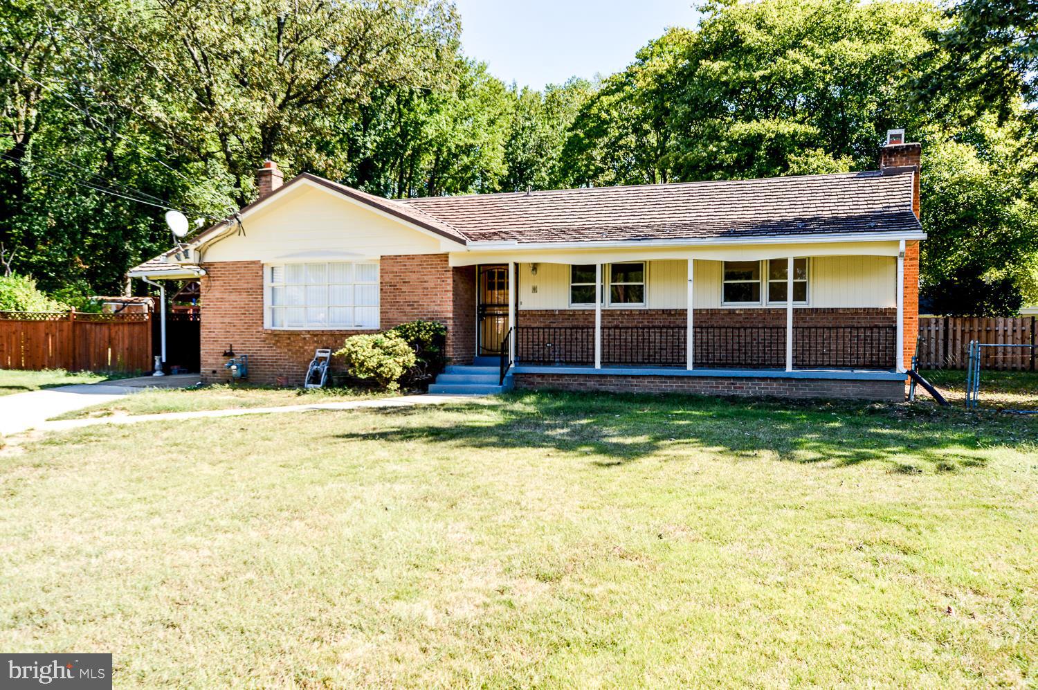 Gorgeous renovated home, warm wood floors, newly installed wood grain tile in kitchen, stainless steel appliances, dining room walks out onto patio. New wood floors in basement, 3 bedrooms upstairs and 2 baths and 1 bedroom and full bath as well as huge rec room with fireplace in the walk out basement. Outside play equipment. Fenced backyard.