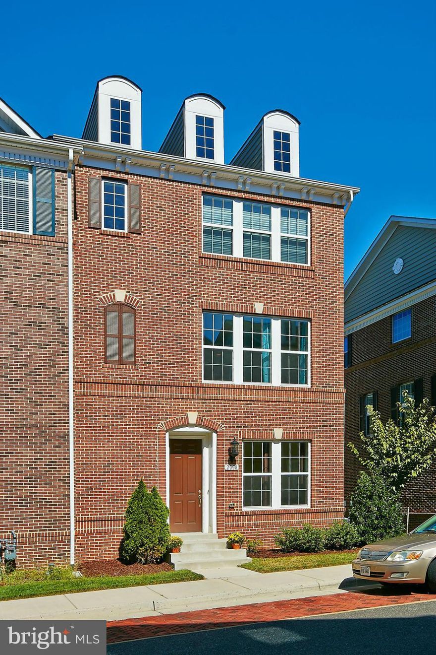 Open floor plan, loads of light!. Lovely, end unit 3 bedroom, 3.5 bath townhome with two-car garage.  Updated kitchen w/granite counters, breakfast bar and stainless appliances. Living room w gas fireplace. Master bath with separate shower/soaking tub. Lower level has office/den w/French doors, window, closet, bath, possible 4th bedroom. Walk to Metro.