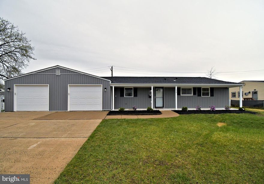 This Remodeled Rancher offers a rare opportunity with large 2 car garage and second driveway for additional parking.  Great curb appeal with fresh landscaping, exterior lighting, new front door, and covered front porch ideal for your favorite rocking chair.  Inside you will find a brand new kitchen with high hat lighting, subway tile backsplash, Silestone counters, stainless steel appliances, and laundry.  Kitchen is open to the Living and Dining Room.  Living Room features sliding doors out to the covered rear porch and fenced in yard.  Hallway features linen closet and updated full bathroom.  Main bedroom has a double closet and full bath.  Two additional bedrooms complete the home.  New HVAC. Two car garage features new doors, openers, keypad entry's, and freshly panted floor.  Fenced in rear yard has a second driveway great for extra vehicles or camper.