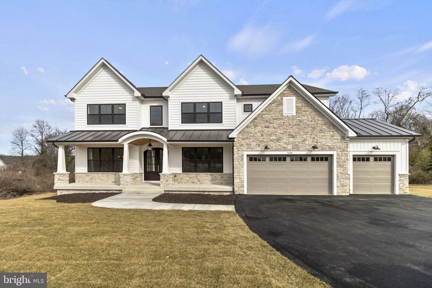 ** New trex rear deck ** and expanded backyard WATERFRONT HOME - This luxurious 6 bedroom, 5.5 bathroom custom build is a dream home in a high-end water front community. Spanning over 6000+ SF, this build considers every detail for style and comfort and only the finest finishes optimizing modern luxury.

Soft contemporary neutral tones and bright recessed lighting are complemented by brilliant natural light that pours into expansive living space. Entertain in the great room with a floor to ceiling stone fireplace, served by a designer kitchen with beautiful quartzite countertops and premium appliances. Other highlights include your own private meandering path that leads you directly to the water, a 3 car garage, an optional rear deck overlooking a private tree lined backyard, an expansive Primary suite with a trayed shiplap ceiling, Designer capital lighting, spa-like baths, and a completely finished walk out basement with an optional wet bar for more entertaining. Annapolis waterfront living doesn't get much better than this! Enjoy the comfort of being near exemplary schools, the city of Annapolis, dining, shopping and water activities. Also near major commuting routes to D.C, Baltimore and the Bay Bridge.

- floor plan and site plan is included in documents (we have added a powder room to the main level that doesn't show on original plans)
- make sure to check out virtual tours for a video walk through of the home