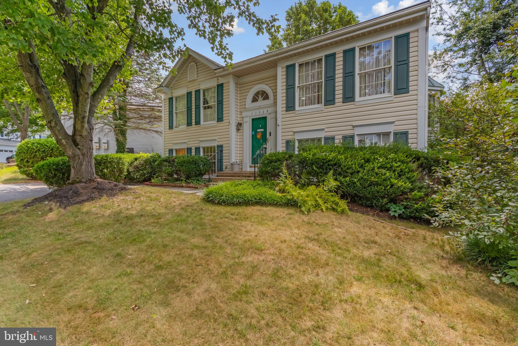 Spacious split-foyer home offering 5 bedrooms and 2 full bathrooms in a sought-after Germantown location. The bright kitchen features abundant cabinetry, a center island, and a skylight, and flows into the dining area for easy entertaining. Enjoy the four-season sunroom addition with skylights, leading to a deck with a retractable awning overlooking a nicely sized backyard. The fully finished basement provides additional living space and flexibility. Situated on a quiet street near parks, schools, shopping, dining, and major commuter routes for easy access to I-270 and surrounding areas.