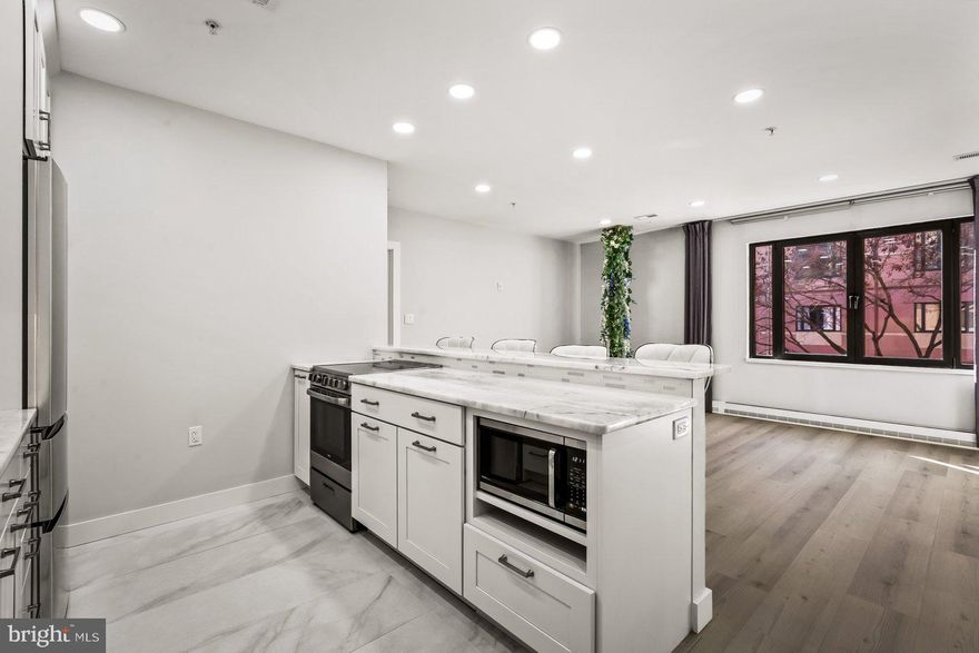 Welcome home to 1000 Fell Street, unit #335! Enjoy the convenience as you enter unparalleled luxury in this recently renovated 1 bedroom & 1 full bath Fells Point condo, a water-oriented haven where modern elegance and historic charm converge! Highlighting the seamless blend of contemporary design and timeless sophistication, enjoy Luxury vinyl wood-like floors, an open floor plan, and a chef's dream kitchen with stainless steel appliances and quartz countertops. With in-unit laundry, ample storage, and proximity to vibrant city life, this condo epitomizes refined urban living on the water's edge.  This unit & building have one of the best walkability scores in Baltimore City! You can walk to shops, restaurants, groceries and bars!
Welcome to your waterfront sanctuary!