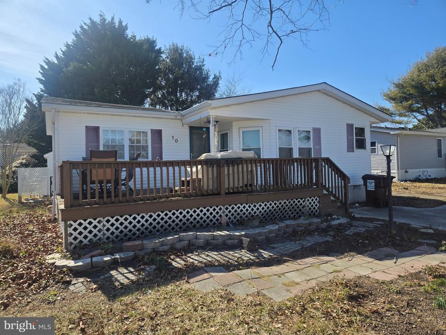 You can change anything about a house....except its location! 10 Ensign Dr., is a GREAT location.  The community of Mystic Harbour is located  in West Ocean City; a short drive to the beaches and resort attractions of Ocean City, the charm of downtown Berlin, and the natural beauty of Assateague Island National Seashore.  The community offers an outdoor pool,  along with low HOA fees and property taxes. This home is in need of extensive rehab and priced accordingly for an 'as is' sale.  Perfect opportunity for someone looking for a project with great upside potential.