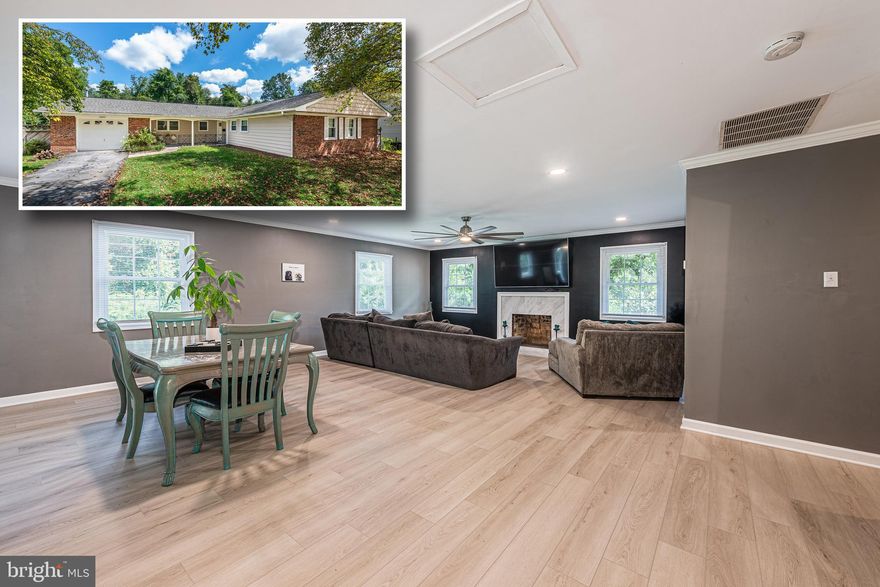 BEAUTIFULLY REDESIGNED OPEN CONCEPT RANCHER WITH TONS OF NATURAL LIGHT ON 0.31 ACRE! This home is in fantastic condition and was recently renovated. There is brand new LVP flooring throughout living room and hallways, as well as brand new carpet in family room and all bedrooms. Fresh paint throughout the house. Roof, Electrical Panel, Windows and Sliding Glass Door, Kitchen, and both Bathrooms all renovated within the last 5 years. As you step inside the front door, you immediately notice how large the living room and dining room spaces are, and you can't help but to notice the amount of natural light pouring into the home from the many windows around the home. To your right the 3 nicely sized bedrooms and 2 bathrooms are separated from the living areas in the house (which includes a master bedroom with en suite bath.) To your left is the open concept kitchen with beautiful cabinets and appliances that opens into the family room. Through the family room is access to your separated laundry room that also leads to the garage. At the rear of the home, a large sliding glass door leads to a nice paved patio and a huge fenced in backyard! This is a lovely home and is sure to go quickly!