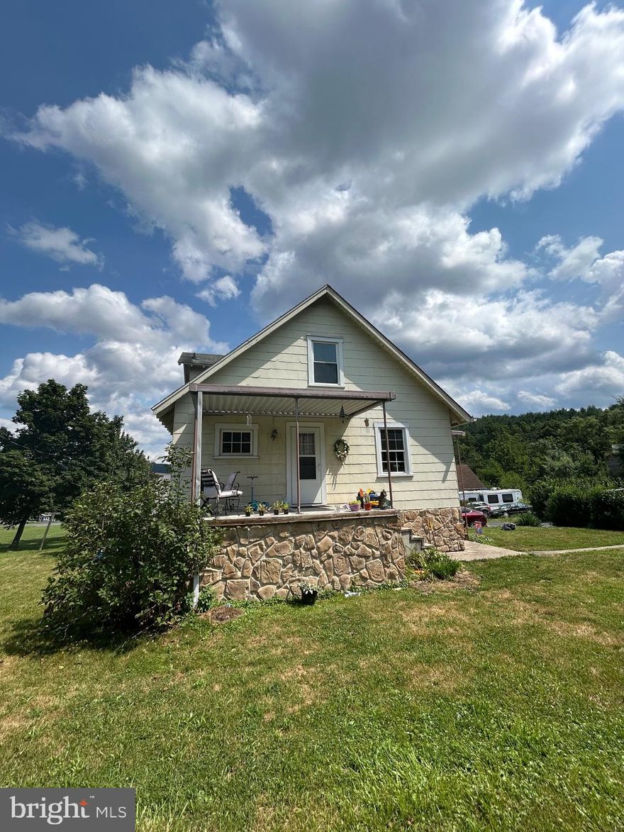 "Cute House Alert! This charming and affordable gem, nestled outside city limits and off the main drag, offers the perfect blend of rustic character and modern convenience. Step inside and admire the warm wood trim and solid wood floors that flow throughout the home, highlighting its cozy nooks and crannies.
Imagine relaxing on your porch and soaking in the tranquil mountain views, while knowing you're still close to all amenities. This location is ideal for those seeking a peaceful retreat without sacrificing accessibility. You'll find yourself conveniently located near major employers like Northrop Drummond and IBM, as well as medical facilities like UPMC (hospital). Outdoor enthusiasts will appreciate the easy access to bike trails and river access, allowing for endless adventures.

The estimated cost of repairs from a previous appraisal  is a budget-friendly $3,500, allowing you to easily add your finishing touches and transform this house into your dream home. This is an incredible opportunity to own a charming property with immense potential in a highly sought-after location.