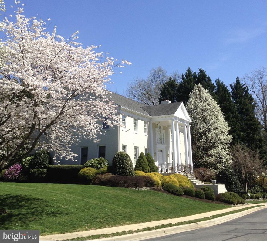 Situated as the first home on 52nd Street—where Old Spring Valley meets New—this grand, impeccably maintained colonial sits on one of the largest lots in the neighborhood (approx. ½ acre). Graciously scaled, banquet-sized rooms throughout with high ceilings, hardwood floors, and refined architectural detailing. Dramatic two-story foyer, private library, expansive family room, and gourmet kitchen designed for full-scale entertaining. The home feels exceptionally spacious and grand at every turn. Outdoor living includes an extensive flagstone patio and mature, landscaped privacy screening.
