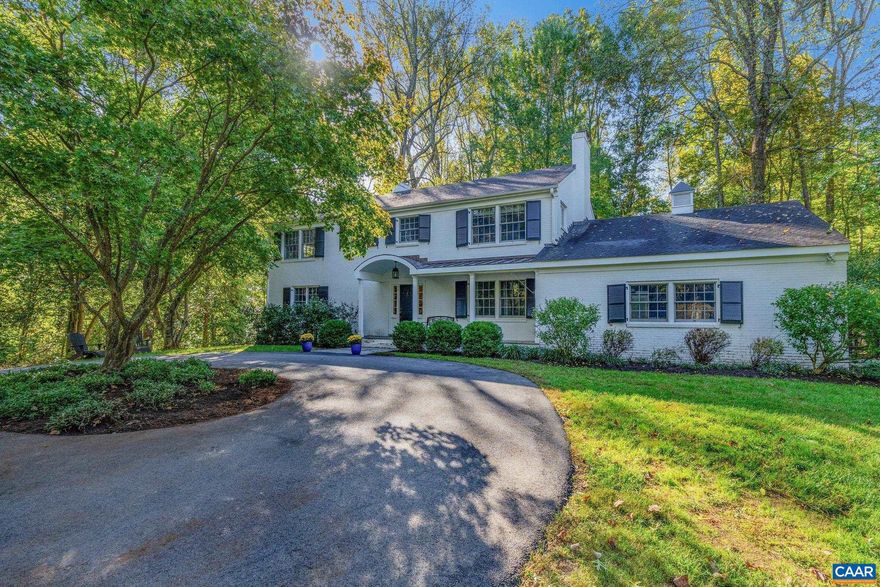 In Flordon, this classic brick residence, painted white, has been renovated to blend lasting charm with modern convenience. There are five bedrooms, including a large primary suite with three walk-in closets, a luxurious ensuite bathroom, and a fireplace. The main level features an updated kitchen with marble countertops and a gas range, a formal dining room, seamless transitions from multiple comfortable living rooms, the functionality of two bathrooms and a mudroom with cubbies, and access to the screened porch, back yard, and garage. The terrace level has a bedroom, full bathroom, enormous rec room, and wet bar. Additional highlights include a gracious foyer, three fireplaces in total, five full bathrooms, numerous built-ins, thoughtful design on all three floors, and considerable storage. The nearly level, 1.57-acre lot has a fenced back yard, large side yard, two driveways, and ample space for property enhancements, if desired. Enjoy proximity to all things Charlottesville, UVA, myriad conveniences, Western schools, private schools, and more. In a terrific location, come see a house that makes everyday living effortless and enjoyable.,Marble Counter,White Cabinets,Wood Cabinets,Fireplace in Basement,Fireplace in Den,Fireplace in Master Bedroom