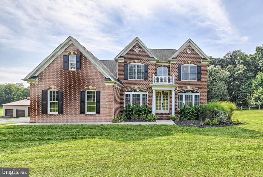 Welcome to your own private little piece of paradise. This oasis offers so much more than meets the eye. Enjoy the quiet sounds of nature... birds chirping, creek babbling, chickens clucking, and maybe even the sound of thundering hooves frolicking in the pastures. How about a serene hiking/riding trail in the woods?  Coffee in the morning on the patio? The open floor plan of the immaculate living space is sure to please. From the gourmet kitchen, to the stunning wood floors, to the 18' ceiling in the living area you will not be disappointed. The unique architecture of the foyer is a must see. Up the open staircase you will find a primary bedroom with a tray ceiling, walk-in closet, and pocket doors leading to the primary bath,  Did someone mention a 40 x 60 detached garage complete with 2 stalls, water, and electric?  Let's not forget a full walk-out basement. All this nestled away in the quiet countryside of North Harford Schools.  This is certainly one you will not want to miss!