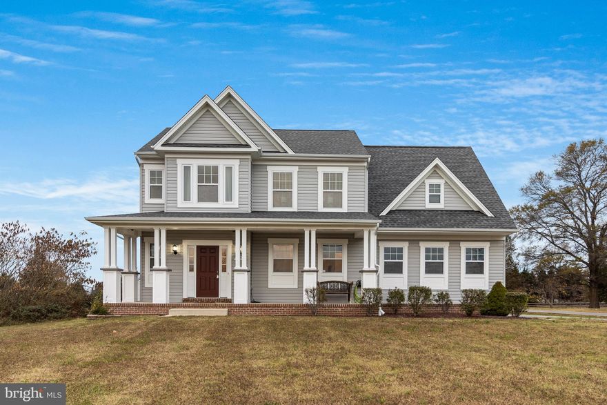 * Offers have been received and sellers have set a deadline for Sunday, November 24th at 6PM. Please have all offers to the listing agent by then. Sellers will be making a decision no later than the morning of Monday, November 25th. * Welcome to Your Next Home in Prince Frederick! This beautifully maintained, fully-finished, three-story home built in 2015 is ready for you to move right in—with NO HOA! Located in the desirable Prince Frederick area, this home offers everything you've been looking for, all within a short commute to Charles County, downtown Prince Frederick, and more.  The charming front porch with square columns welcomes you home, while the backyard patio provides breathtaking views of classic Calvert County cornfields and soybean fields. Inside, the open-concept main level is perfect for both everyday living and entertaining. The kitchen features an eat-at counter and space for a dining room table, flowing seamlessly into the cozy living area. The combined laundry room and mudroom, conveniently located off the two-car garage, adds practicality to your day-to-day routine. Upstairs, you’ll find four spacious bedrooms, each with large closets. The owner’s suite is a true haven, complete with vaulted ceilings, a luxurious en-suite bathroom with a soaking tub, a walk-in shower, and plenty of natural light.  The fully finished basement with Luxury Vinyl Plank flooring provides additional living space, perfect for a home office, playroom, or entertaining guests. The walk-up exit leads to the backyard, making it easy to enjoy the outdoors. If you’ve been searching for the perfect next home, this is it! Schedule your showing today and make it yours.