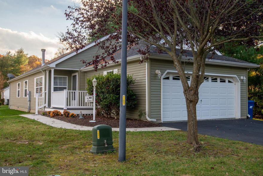 Situated on a corner lot in the peaceful community of Southern Meadow, this immaculate Campanula model is move-in ready and waiting for its new owners. Inside, you’ll find a bright and open layout connecting the living, dining, and kitchen areas, perfect for both everyday living and entertaining. The spacious living room is highlighted by a large gas fireplace, while the kitchen offers stainless steel appliances, a generous island, and abundant storage.

Just off the main living space is a versatile den currently used as a second living area. This flexible room can easily transform into an additional bedroom, craft room, home office, or even a cozy man cave-whatever best suits your needs. A sizable guest bathroom and a full laundry/utility room lead the way to the expansive primary suite, complete with its own private en-suite bath.

Southern Meadow residents enjoy a wealth of amenities including a large clubhouse with pool, walking paths, dog park, community garden, and catch-and-release ponds. The monthly lot rent of $732 covers trash and sewer services, lawn care, snow removal, and full access to all community amenities. Plus, Southern Meadow offers a unique 15-year lease option with capped annual increases of just 3%, giving homeowners peace of mind and predictable budgeting-no more unexpected 5–7% jumps!
Schedule your showing TODAY!