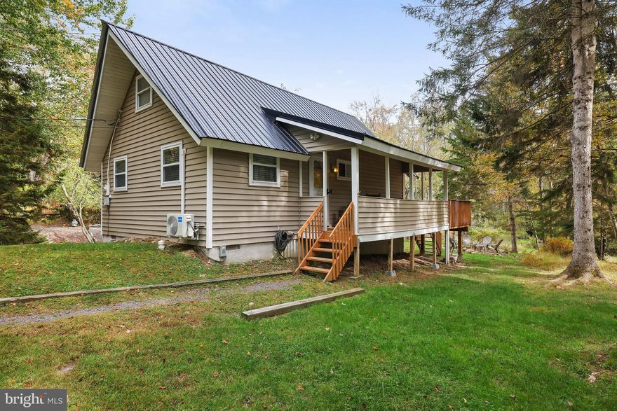 ESCAPE TO YOUR VERY ON RETREAT! Charming & Newly Renovated Chalet Features 2BED/1BATH w/ Loft. Nestled in a tranquil setting this home combines modern comfort with rustic touches providing cozy comfort throughout. Key Features include, Open floor concept , Stylish LVP flooring throughout, Kitchen Island W GRANITE countertops ,Large loft area makes the perfect space for a recreation room or 3rd bedroom. Step outside to your backyard and enjoy your own private slice of nature with a flowing stream and firepit, perfect for unwinding and entertaining. Community features include swimming, boating, tennis and clubhouse. Home is being sold Turn- Key, just pack your bags and move right in. Whether you are looking for a year round, vacation or investment this property surly will check all the boxes. Close to all major POCONO attractions, restaurants, shopping I -80 & PA turnpike. SCHECDULE YOUR SHOWING TODAY!