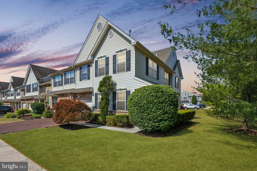 Price Reduced!  Welcome to the sought-after Waterford Greene Community in the Spring-Ford Area School District boasting 2567 square feet with a finished basement! This end unit features a private side entrance leading to a hardwood foyer.  Enjoy the covered front porch with mature landscaping for privacy.   The layout includes both a formal living room and a family room, the latter boasting a wall of windows for ample natural light and custom window treatments. The family room seamlessly connects to the updated kitchen, which leads out to the outdoor deck. With modern appliances, including a Samsung Family Hub Refrigerator, the kitchen is well-equipped. The deck was recently re-stained in 2024. Upstairs, the family room opens to a catwalk stairway leading to three bedrooms and a laundry room. The master bedroom showcases a double door entry, vaulted ceilings, a walk-in closet, and a master bathroom with tile floors, a soaking tub, shower stall, and double vanity. The finished basement offers a custom wall shelf, an extra office space/workout room, and storage. 1 car garage with interior access , one car driveway parking.  The two story family room, kitchen and dining have been freshly painted July 2024.  The home has been recently power washed, landscaped, and the HVAC system serviced. Residents can enjoy the community clubhouse, available for event rentals, and a nearby playground. Conveniently located close to major roads, shopping, and dining, this home offers a welcoming setting of its own.