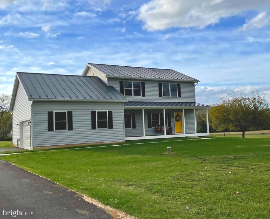 Welcome to your idyllic retreat, where stunning mountain and countryside views greet you from every window. This captivating 4-bedroom, 2.5-bath home with 2-car side-load garage is the perfect sanctuary to relax and escape from the hustle and bustle of everyday life. Nestled on 4.5 picturesque acres, this thoughtfully designed home provides energy efficiency with state-of-the-art geothermal heating and cooling, as well as freestanding, owned solar panels. 2x6 framing, and R-41 rated attic insulation to enhance the energy efficiency. The main level open floor plan includes a living room, bedroom or home office, kitchen, dining area, family room, and laundry room. The spacious kitchen is a chef's delight, boasting quartz countertops, a large island with seating, and new stainless-steel appliances.  Luxury vinyl tile graces the floors. Upstairs, the primary suite offers double closets and a luxurious full bath with dual sinks, an oversized shower, and ceramic tile. Two additional bedrooms with walk-in closets and hall bath with ceramic tile complete the upper level. Enjoy your morning coffee on the spacious front porch with unobstructed eastern views of Black Rock on South Mountain or on the rear patio just off the family room. Construction on this wonderful home began in 2023 with expansion and completion in 2025, so much is brand new.   Conveniently located off the first exit into Washington County from Frederick, you'll have easy access to Interstate 70.  The perfect setting, the perfect home, the perfect place for creating incredible family memories. Don't miss this rare opportunity. Schedule a tour today and see for yourself why this home is perfect for you!