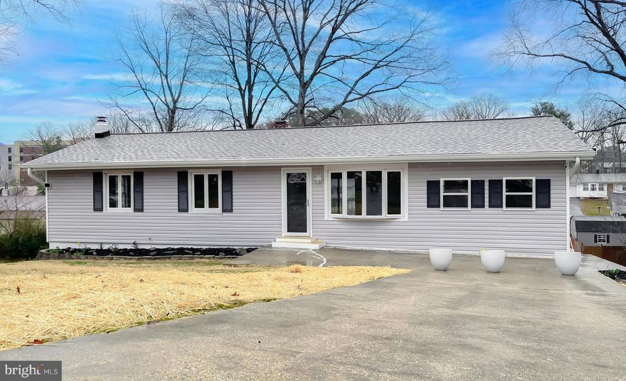 Fully remodeled 1900 square foot home combines modern updates with functional living spaces. The main floor offers three spacious bedrooms, and 3 full baths. Main floor has Galley-style kitchen with brand-new appliances, and a dining room that opens to a deck. Enjoy a cozy three-season room with its own heating and air system, ideal for year-round use. The lower level features a walk out patio, a large recreation room, a half bath, a generous laundry room and an additional bedroom. The entire home is equipped with all new flooring, and the spacious backyard is perfect for entertaining. Plus, recent updates include a brand-new roof, HVAC system and hot water heater.