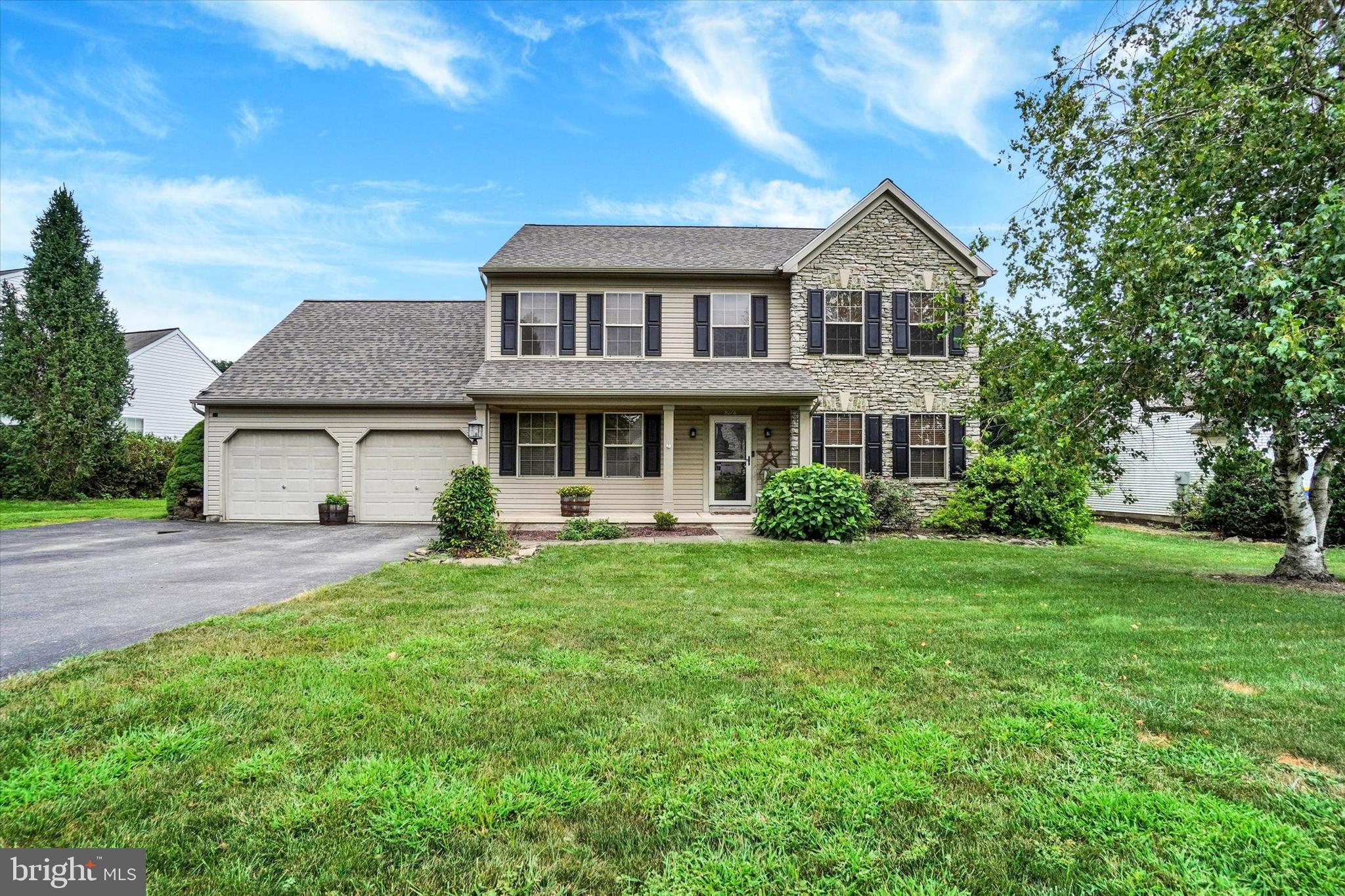 Check out this Spacious 2 Story home located in the desirable Ashley Farms! Great curb appeal with a covered front porch, stone front & a brand NEW roof last month! Foyer w/hardwood flooring that continues into the Formal Dining Room, Living Room & Half Bath. The Kitchen & Dining Area offers ceramic tile floors, an island & Stainless-steel appliances all included with the sale. The Family Room is open to the kitchen with a half wall separating them. This room offers laminate plank floors a cozy gas fireplace with built-in cabinets & shelves on each side, a ceiling fan & a shiplap accent wall! Updated Sliding glass door with built-in blinds lead out to the patio & fenced yard. The separate patio has electric ran for future hot tub area & there is a storage shed (that needs a little TLC but still provides a good place to store the lawn equipment). The upper level of the home offers 4 Bedrooms + Laundry area in the hallway. There are 3 large Bedrooms with wall to wall carpeting & ceiling fans. The 4th Bedroom, the Primary Bedroom, has newer luxury vinyl plank floors, vaulted ceiling w/ceiling fan, 10'x7' walk in closet (w/access to unfinished walk-in attic space) & a large private Bathroom w/double bowl sinks, separate shower & whirlpool tub to relax & unwind in! The main full Bath on this level has updated luxury vinyl plank floors, a large vanity & tub/shower. The Lower Level offers finished space for a Guest Room or Office, Rec Room or Gaming Room...the possibilities are endless. There is also an unfinished room that houses the mechanicals. The home offers natural gas heat & central air. The Central air unit was replaced in 2022! There are also Solar panels helping to offset the rising cost of electric. (the lease info is attached to associated docs). 2 Car Garage & oversized paved parking area! This home does need some cosmetics but offers a lot of space with some major upgrades completed! Take a look today!