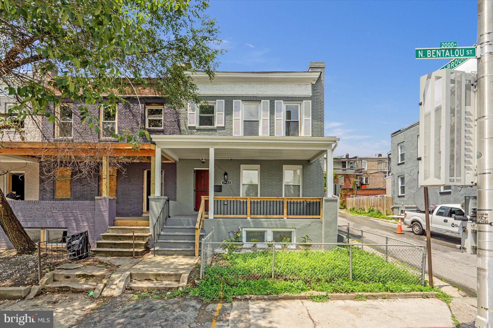 Experience modern urban living in this fully renovated 4-bedroom, 3.5-bath townhouse at 1922 N Bentalou St in Baltimore. Spanning 2,300 square feet, this home seamlessly blends contemporary design with functional elegance.​
The main floor welcomes you with an open-concept layout, featuring an electric fireplace that adds warmth and ambiance. The gourmet kitchen is a chef's delight, equipped with stainless steel appliances, quartz countertops, and custom cabinetry. Conveniently located on this level is a washer and dryer, enhancing everyday living.​
Upstairs, the primary suite offers a private retreat with an ensuite bathroom and a spacious walk-in closet. Two additional bedrooms are connected by a stylish Jack and Jill bathroom, providing both comfort and privacy.​
Additional highlights include new windows throughout, a two-car parking pad, and a fully finished basement that adds versatile living space. All renovations have been completed with approved permits, ensuring quality and compliance.​
Located in the vibrant Mondawmin neighborhood, this home is just minutes from downtown Baltimore, offering easy access to shopping, dining, and entertainment.​
Don't miss the opportunity to own this exceptional property.