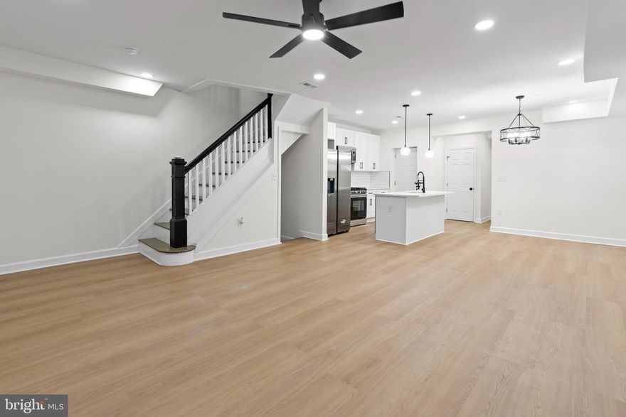 Experience modern urban living in this fully renovated 4-bedroom, 3.5-bath townhouse at 1922 N Bentalou St in Baltimore. Spanning 2,300 square feet, this home seamlessly blends contemporary design with functional elegance.​


The main floor welcomes you with an open-concept layout, featuring an electric fireplace that adds warmth and ambiance. The gourmet kitchen is a chef's delight, equipped with stainless steel appliances, quartz countertops, and custom cabinetry. Conveniently located on this level is a washer and dryer, enhancing everyday living.​

Upstairs, the primary suite offers a private retreat with an ensuite bathroom and a spacious walk-in closet. Two additional bedrooms are connected by a stylish Jack and Jill bathroom, providing both comfort and privacy.​

Additional highlights include new windows throughout, a two-car parking pad, and a fully finished basement that adds versatile living space. All renovations have been completed with approved permits, ensuring quality and compliance.​

Located in the vibrant Mondawmin neighborhood, this home is just minutes from downtown Baltimore, offering easy access to shopping, dining, and entertainment.​


Don't miss the opportunity to own this exceptional property.
