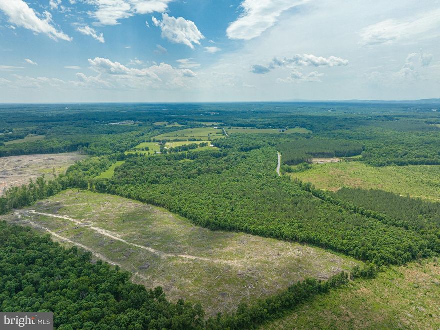 Buyer defaulted and didn't show at settlement! Once-in-a-lifetime opportunity to own your own working farm, while enjoying all of today’s modern amenities! 6305 Governor Almond Road offers over 100 acres of pristine farmland, and a stately brick colonial to call home! The property was custom-built in 2002, and offers 3 bedrooms,  a home office and 3 full bathrooms spread across almost 3000 square feet. Hardwood floors run throughout the main level, which features a gorgeous formal entrance, a formal dining room, and a music room with vaulted ceilings and french doors that open to the brick porch. Stunning crown molding and upgraded lighting throughout. Upstairs, find a luxurious owner’s retreat with a private bath with a whirlpool tub. Outside is a massive 2 level deck, with a Sun Setter remote-controlled awning. Attached 2 car garage. Private, quiet and secluded with abundant wildlife - yet conveniently located near shopping and restaurants in Locust Grove. Easy access to I-95, and Fredericksburg, Richmond, Washington DC and Dulles Airport.  Property conveys with hay barn, corral and Morton metal building. Please note total acreage reflects two adjacent parcels that will be sold in one transaction. If buyers use Legacy Mortgage they can receive a lender credit up to $10,000. Terms and conditions apply. Subject to loan approval.