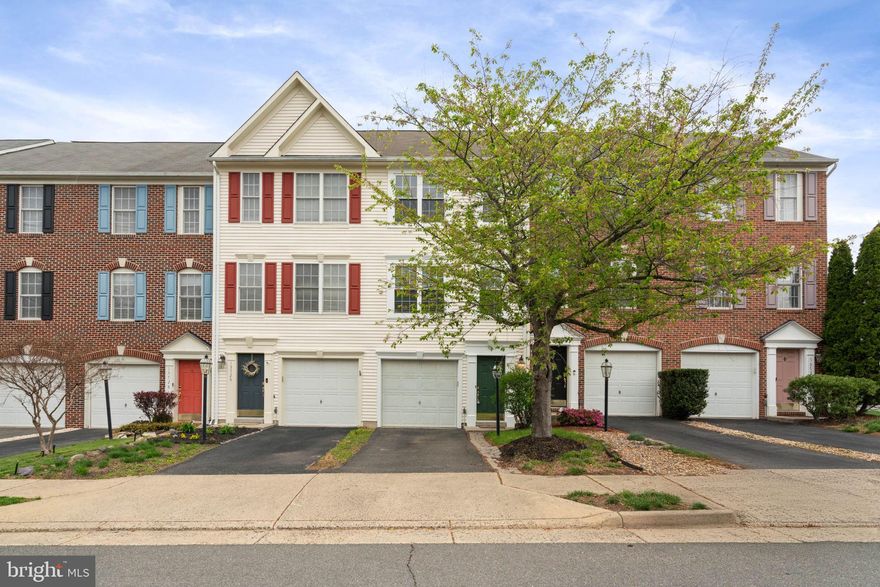 Move-in ready townhome in sought-after Kingsbrooke! This well-maintained home features a one-car garage and a spacious, open main level with an updated kitchen boasting granite countertops, stainless steel appliances, and a cozy dining area. The bright family and dining room combo includes a gas fireplace and access to a large deck—perfect for entertaining. Upstairs, enjoy a spacious owner’s suite with a private bath and generous closet space, plus an additional large bedroom and full hall bath. The finished lower level offers a versatile rec room, laundry area, and walk-out to the fully fenced rear yard. Recent updates include fresh paint, new windows, deck, fence, and hot water heater. Enjoy all the amenities Kingsbrooke has to offer—pool, tennis, playgrounds—and a convenient location near shopping, dining, and major routes!