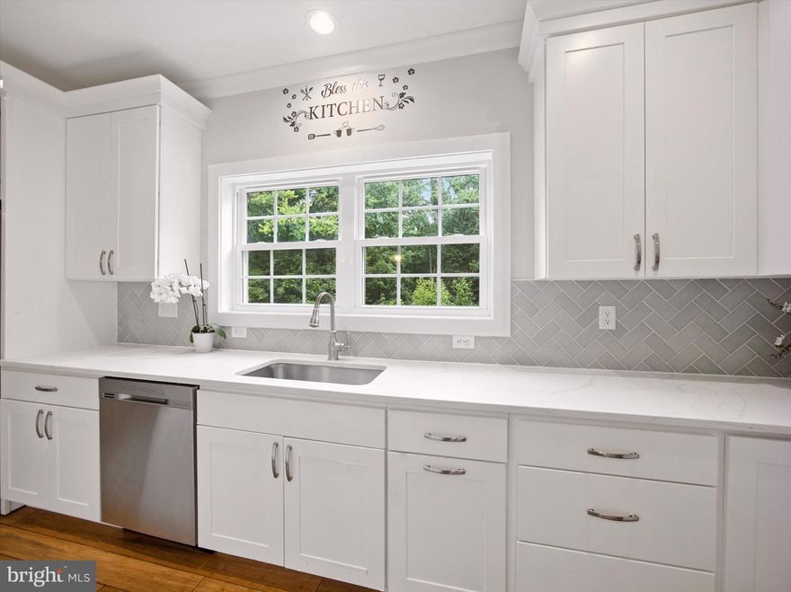 Welcome to 7432 Race Road—a modern retreat built in 2022 and nestled on nearly an acre in sought-after Hanover, MD. This impressive 4-bedroom, 2.5-bath home blends luxury, comfort, and convenience with no HOA restrictions!

Step inside to soaring cathedral ceilings and a stately dining room, perfect for entertaining. The open-concept kitchen is a chef’s dream, featuring gleaming quartz countertops, stainless steel appliances, a spacious island, and a large pantry. The adjoining breakfast area flows seamlessly into the family room, where a cozy gas fireplace sets the scene for relaxing evenings.

Everyday living is a breeze with a main-level laundry room (washer & dryer included) that offers direct access to the oversized two-car garage and a convenient powder room for guests.

Upstairs, discover four generous bedrooms and a beautifully updated hall bath. The primary suite is a true sanctuary—large enough for a king bed and a sitting area, with a walk-in closet and a spa-inspired bath. Unwind in the gorgeous soaking tub or the separate glass-enclosed shower, all accented by stunning white marble flooring and a private water closet.

Enjoy the privacy and space of your nearly one-acre lot, tucked away yet just minutes from major highways for an easy commute. You’re close to everything—Maryland’s largest shopping and entertainment destination, Arundel Mills, is just down the road, offering endless dining, shopping, and fun at Live! Casino & Hotel Maryland. Outdoor lovers will appreciate nearby parks, while travelers will love the proximity to BWI Airport. Plus, you’re just a short drive to Baltimore, Annapolis, and Washington, DC.

Don’t miss this rare opportunity to own a newer home with modern finishes, a flexible open layout, and unbeatable access to everything Anne Arundel County has to offer—all without the hassle of an HOA!

Ready to make 7432 Race Road your new address? Schedule your private tour today!