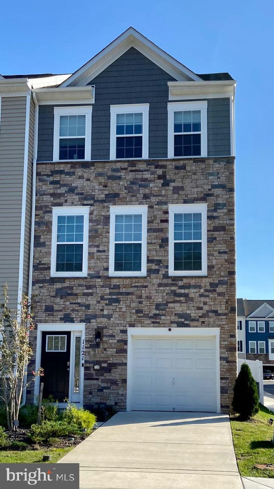 Lives like a Model Home.  Welcome to this end-unit 3-level luxury garage townhome.  The main level walk-in with a large family room with a slider to the back yard and door to the garage. Up the stairs to the large, bright great room, that features a grommet kitchen for any chef, dining room area, and living room area. Deck off the living room area and upgraded lament flooring. Up one more level to the bedrooms, primary with walk-in closet, chandler, and primary bath with double sinks and walk-in shower.  Two more bedrooms, both with chandlers and full hall bath and laundry closet. Outside has a back fenced-in area, driveway, and more parking right out front of the home.  The home has just been professionally carpets cleaned and new paint.