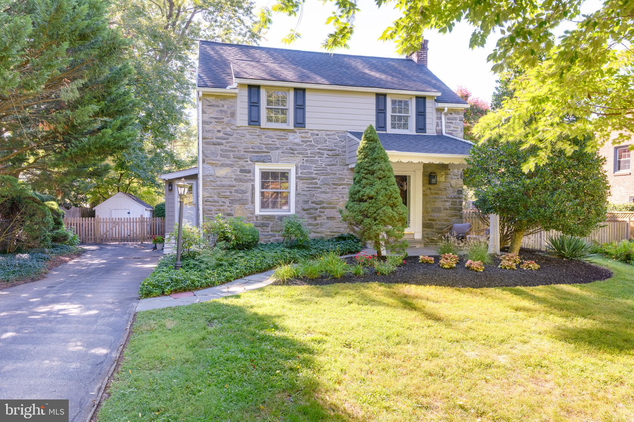 Great curb appeal and an inviting front porch greet you at this tastefully updated and expanded colonial home, located in Bryn Mawr's coveted Old Oaks neighborhood. The main level features a living room with fireplace and recessed lighting, formal dining room, and kitchen with custom white cabinetry, generous countertop and cabinet spaces, modern appliances and recessed lighting. Adjoining the kitchen is the breakfast room with exposed brick wall, vaulted ceiling, skylight, garden window, updated powder room and side entrance. Opening from the breakfast room is the light-filled family room with corner fireplace and sliding door to the patio and private rear yard. Upstairs you will find three spacious bedrooms and a newly renovated hall bathroom with subway tiling, skylight, recessed lighting and laundry area. The lower level is finished and could easily serve as a home office, playroom, or exercise room. Just minutes from transportation, shopping, dining and parks. Award-winning Radnor Township School District. Make an appointment to see this exceptional home today!