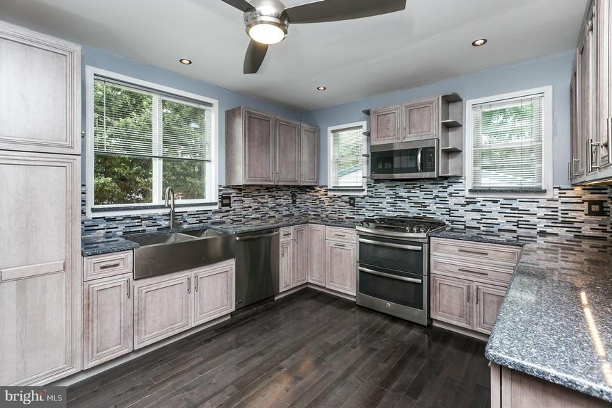 Beautiful Home on a Quiet Street in Waltherson.Gorgeous Gourmet Kitchen w/ Upgraded Cabinets & Appliances,Under Mount Lighting, Quartz Counters and Oversized Barn Sink.Rarely Available 2 Car 22 x 24 foot Garage w/ A/C, Heat & Electric. Fully Finished Lower Level w/ Gas Fireplace. Pellet Stove Warms the Whole House. Composite Deck w/ Retractable Awning. 2 Renovated Baths w/ Soaking Tub & Mounted TV