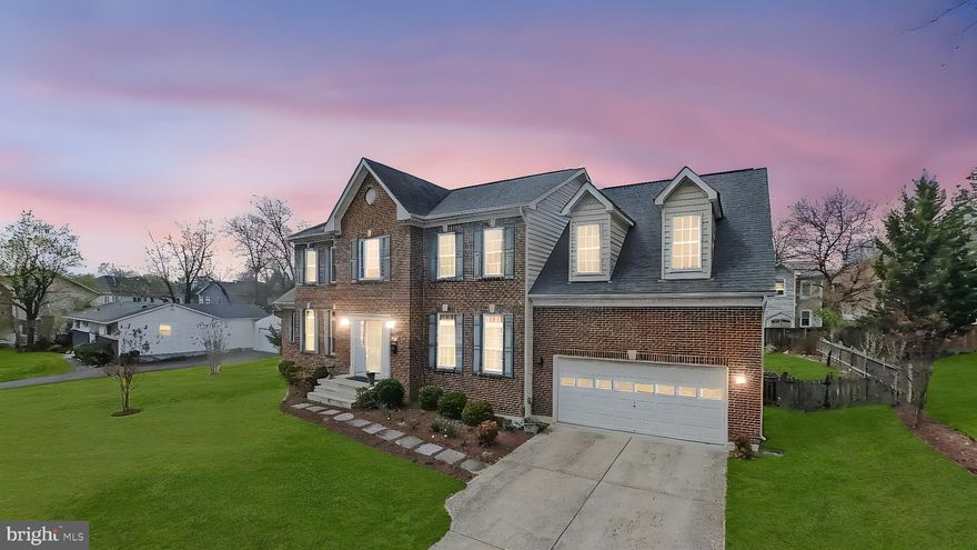 Here’s your chance to own a stunning brick colonial home in the heart of downtown Vienna! Just four blocks from Maple Avenue, this prime location offers effortless access to a variety of restaurants, grocery stores, and shops, including Whole Foods Market, Giant, Caffe Amouri, and the beloved Sandwich Shop. With spring in full bloom and warmer days ahead, imagine leisurely weekend strolls to downtown Vienna, where charming cafés and local boutiques await.

For outdoor enthusiasts, this home is just one block from the W&OD Trail through Delano Drive and surrounded by scenic parks, providing endless opportunities for recreation and relaxation. Commuters will love the convenience of being situated between the Orange and Silver Line Metro stations, with easy access to Tysons Corner, I-66, Route 7, and I-495. Additionally, this home is zoned for the highly sought-after Vienna Elementary, Thoreau Middle, and Madison High School pyramid.

Built in 2012 and meticulously maintained by its original owners, this home still offers endless potential to make it your own. With over 3,200 square feet on the first two levels alone, plus an unfinished walk-up basement with built-in rough-ins, there's ample opportunity to expand and customize your living space.

Step inside to a bright and welcoming foyer filled with natural light streaming through large windows. The main level features a formal living room, a dedicated dining room, and a breathtaking sunroom with high vaulted ceilings, creating an airy and inviting atmosphere. The kitchen is well-equipped with granite countertops, stainless steel appliances, an eat-in area, and an open flow into the cozy family room, where a gas fireplace adds warmth and charm. Just off the kitchen, step out onto the expansive Trex deck overlooking the fully fenced, beautifully flat backyard—an ideal space for entertaining, gardening, or simply unwinding in a private outdoor retreat. The main level also includes a combination laundry room and mudroom with direct access to the garage for added convenience.

Upstairs, you'll find four spacious bedrooms, including two primary suites and two additional bedrooms. The primary suite on the right side of the home features vaulted ceilings, a walk-in closet, a double vanity, a standing shower, and a soaking tub. The second primary suite offers two walk-in closets and an upgraded quartz countertop vanity. The hallway bathroom, serving the secondary bedrooms, has also been beautifully updated with a quartz countertop, tile flooring, and a sleek shower door.

With its unbeatable location, spacious layout, and incredible outdoor space, this home is a rare find in one of Vienna’s most desirable neighborhoods. Don’t miss your chance—schedule your showing today! ***OFFERS (IF ANY) ARE DUE BY 7PM ON SUNDAY, APRIL 6th***