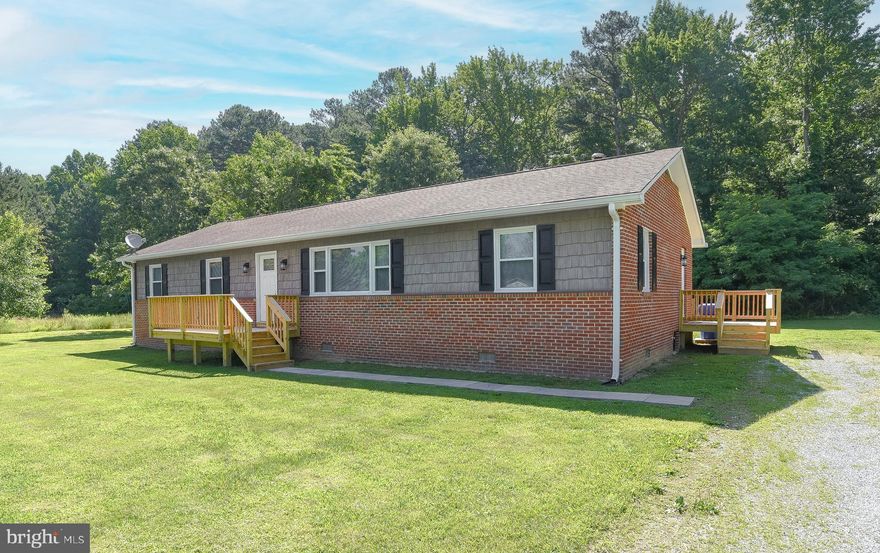 HIDDEN GEM--SOAK IN THE PEACE & QUIET OF COUNTRY LIVING JUST A FEW BLOCK FROM THE WICOMICO RIVER AND JUST AROUND THE CORNER FROM THE COBB ISLAND MARINA & RESTAURANTS! LIVE AN UPSCALE LIFESTYLE--YOUR GUESTS WILL BE IMPRESSED WITH THE STYLISH OPEN FLOOR PLAN--NOTHING HAS BEEN LEFT OUT! RELAX ON THE DECK OR ROMP ON NEARLY AN ACRE  OF NATURE...USE THE 4TH BEDROOM AS A FAMILY ROOM, GAME ROOM, OFFICE OR PLAY ROOM...