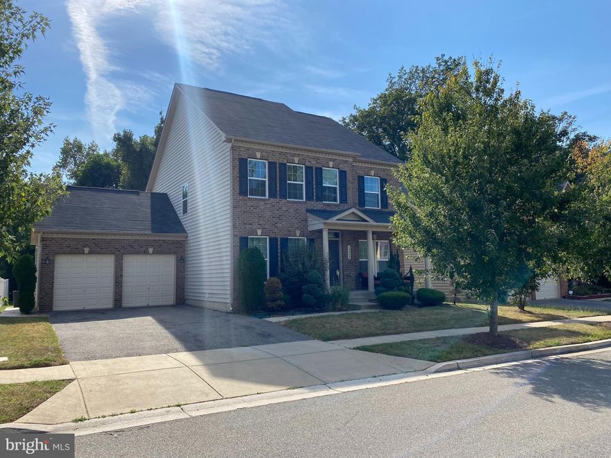 This beautiful brick- front single family 5 bedroom 3.5 bath home backs up to the tree line at the Preserves at Piscataway.   The formal dining has columns and bay windows and living room has trey ceilings and can be also used as an office/den.  The gourmet kitchen featuring porcelain designer flooring, stainless steel appliances, gas cooktop, double oven, granite countertops and bar seating.  The kitchen overlooks the grand family room with coffered ceilings, designer chandelier and corner brick fireplace with a TV mount.  The extended morning room with vaulted ceilings and access to the rear yard is perfect for indoor/outdoor entertaining.  Enjoy the privacy with views of the mature trees and paved lighted rear patio. The owner's suite features a tray ceiling, dual walk-in closet, large shower, linen closet and dual sink vanity. New flooring throughout and freshly painted.    There is an additional 1300 finished sqft on the lower level with built-in stone entertainment wall, wet bar/fridge, and an additional fully updated bathroom and room that can be used for guest/office/den and plenty of storage. Two car garage with driveway parking.  Great location with quick access to National Harbor, Tanger Outlets, Schools, Shopping, etc. Close to VA/DC, major transportation & highways, Andrews AFB, & more. Move in ready home.