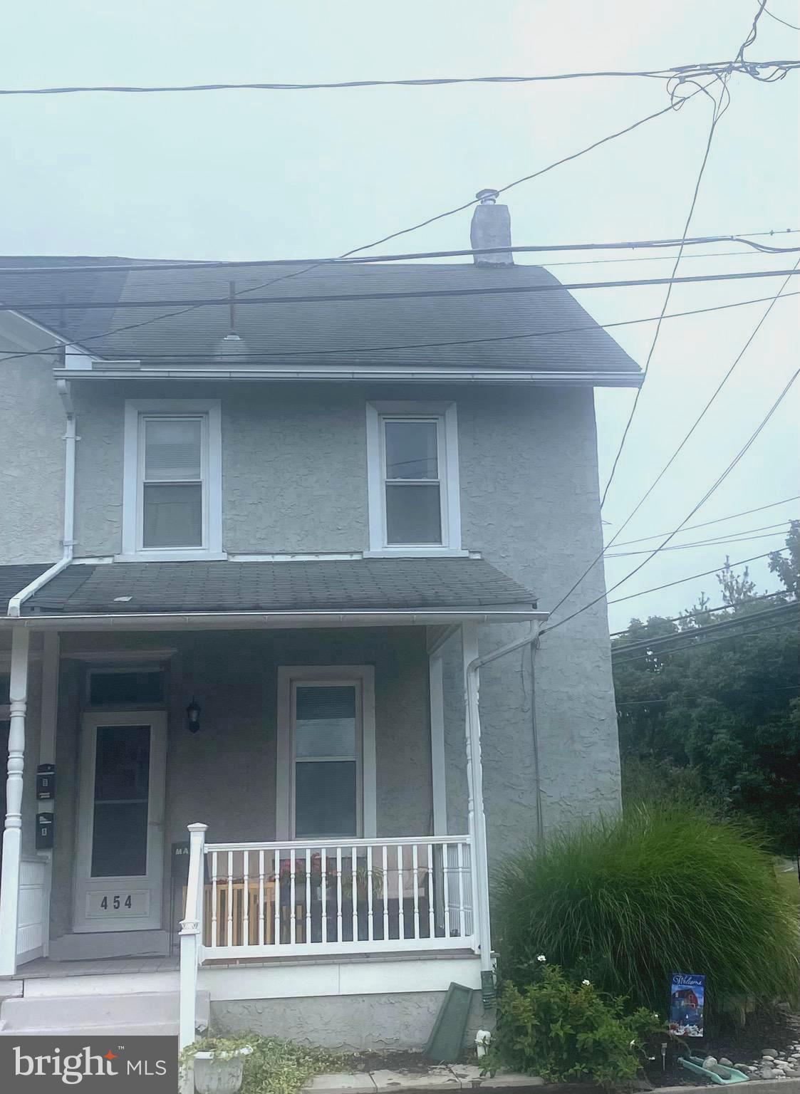 Welcome to 454 Seminary St! **Professional photos are coming soon!**Hurry in to see this updated end of row town home located in the heart of Pennsburg! The rooms are large with impressive 9+ foot ceilings filled with light! There are 3 bedrooms and 1 bath plus additional rooms in the attic with boundless possibilities! Newly carpeted and electric added on this 3rd floor. The kitchen features granite countertops, vinyl plank flooring, built in dishwasher, double sink with long-neck faucet, peninsula with seating and storage plus a large pantry. Convenient mud room located off the kitchen with storage cabinets that will stay with the home. New door to the now fenced back yard and patio plus off street parking. There is a 2nd door located for side entrance . New gas furnace for efficient heating. New water softener. A sump pump and fan in the sealed painted basement floor will remain.
Beautiful colonial style features include built in dining room shelving, wide window ledges with curved walls around the windows and wide original baseboards still remaining throughout the home. Upstairs primary bedroom is spacious with plenty of light coming in through the 3 windows. The 2nd bedroom has double closets with organizers on each side. The bathroom has also been updated with crown molding, bead board, new flooring, toilet and vanity. Sidewalks and curbing on the side of home were replaced in 2018. Vinyl replacement windows for efficiency and a front porch with composite wood & vinyl railing . Close and easy access to the NE turnpike extension, routes 309, 78, 100, 29 and 663. Also convenient to Green Lane Park and the Perkiomen Trail. Walking distance to several eating establishments, grocery stores, banks and the Perkiomen Prep School.