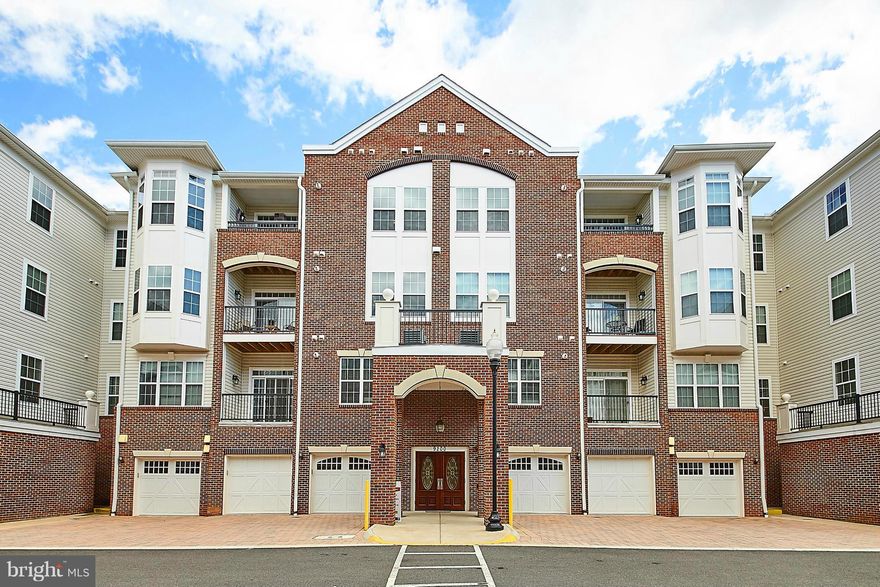 Popular Aspen model with den in the 55+ luxury elevator community of The Gatherings. Upgraded kitchen & baths. Sitting area in MBR.  Separate shower in MBA. Penthouse location!  Basement garage plus one assigned space.  Private clubhouse with fitness center.  Walking distance to shopping.  Close to VRE and Old Town Manassas.